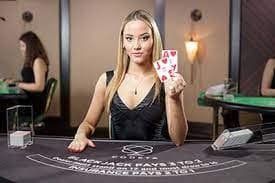 barong baccarat table selection showing multiple variants with dealer profiles and stake limits